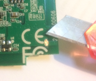 Image of backside of PCB scratch to get more ground Image of backside of PCB scratch to get more ground