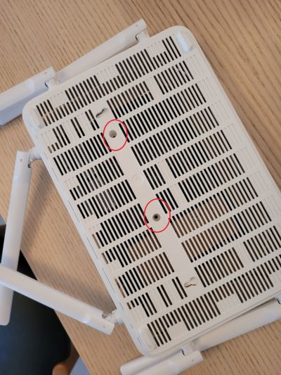 The two screws location are marked in red